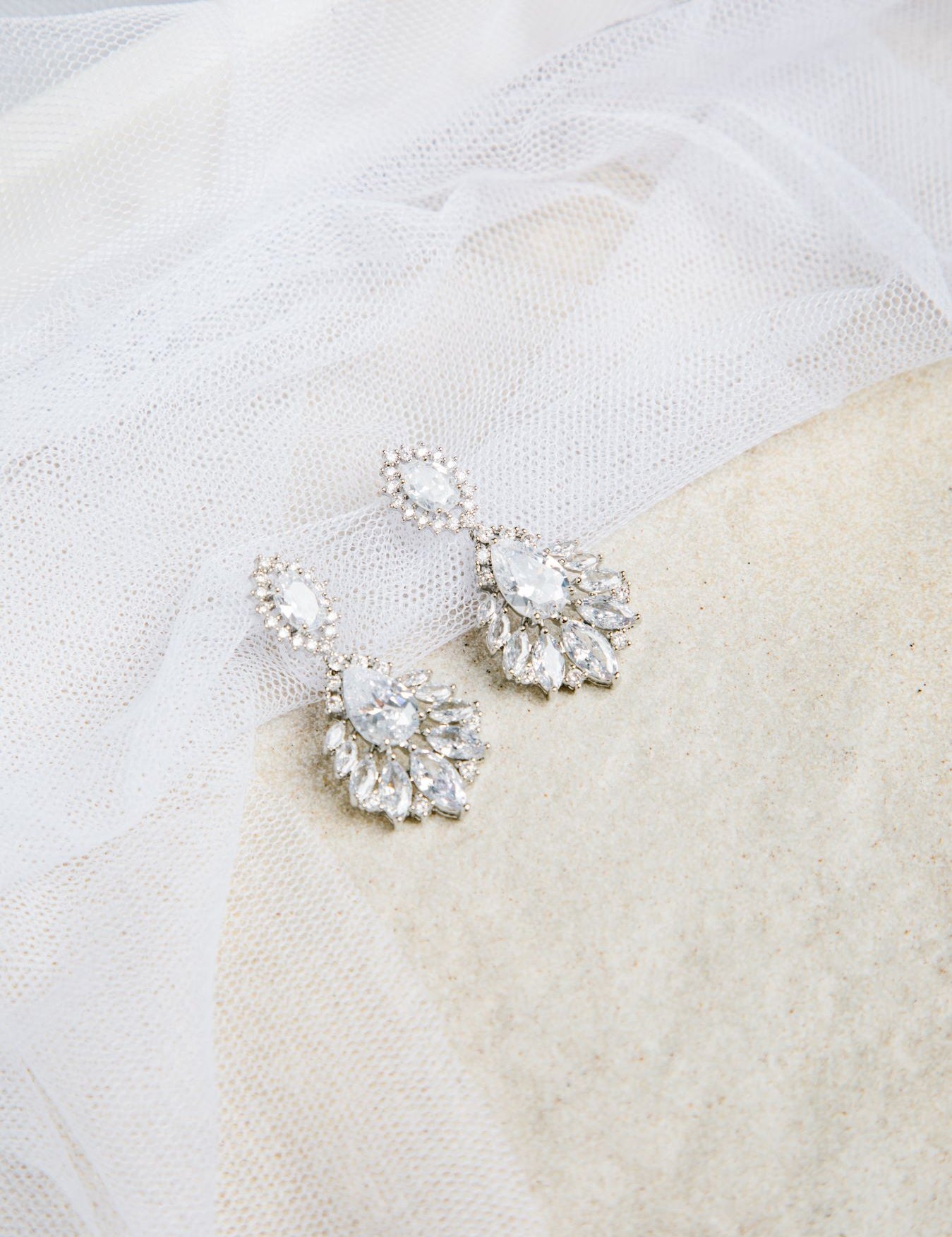 Bella Earrings – silver-tone setting with oval, raindrop, and pointed stones