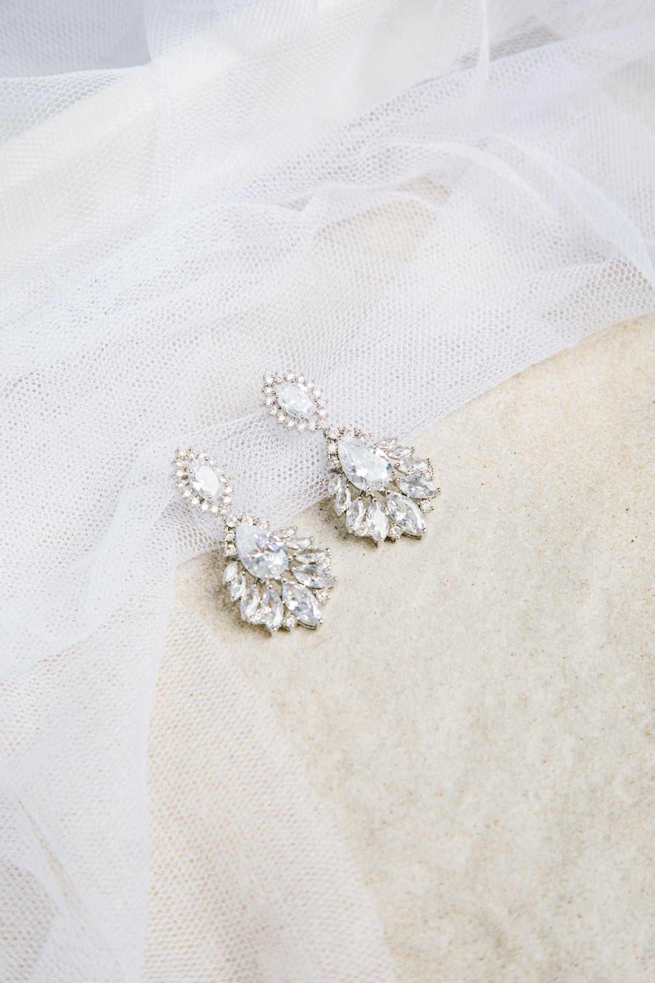 Bella Earrings – silver-tone setting with oval, raindrop, and pointed stones