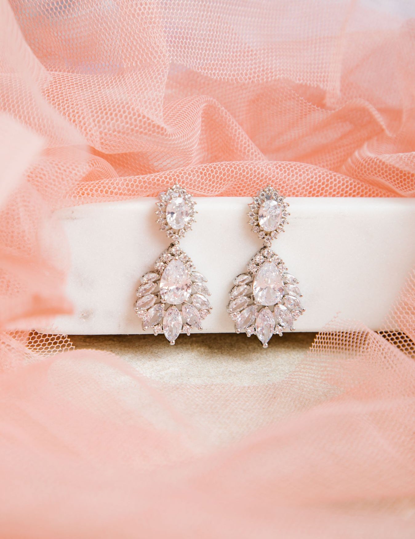 Bella Earrings – silver-tone setting with oval, raindrop, and pointed stones