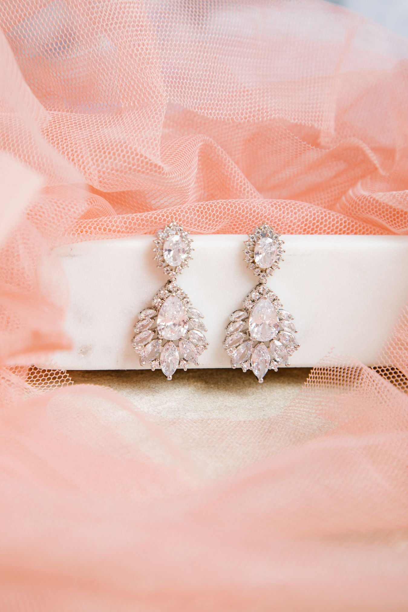 Bella Earrings – silver-tone setting with oval, raindrop, and pointed stones