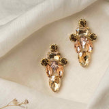 Ciara Earrings in champagne tone – crystal drop earrings on white linen cloth with soft dried flower