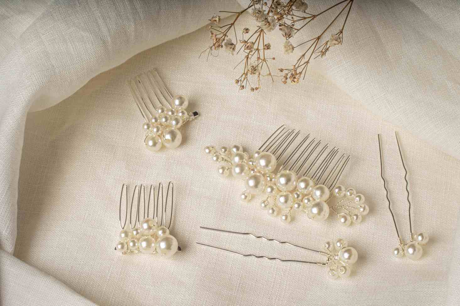  Lisa Hair Pins – full set of silver pearl hair accessories on linen cloth with dried flower in frame