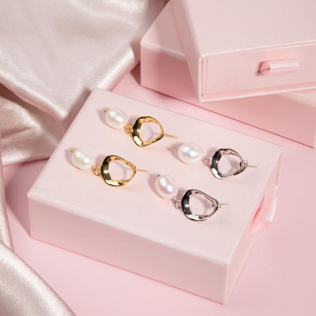 The Sophia earrings are a perfect choice for a delicate and elegant bridesmaid look. Featuring a dainty design with subtle details, these earrings will add just the right amount of sparkle to your wedding day ensemble.