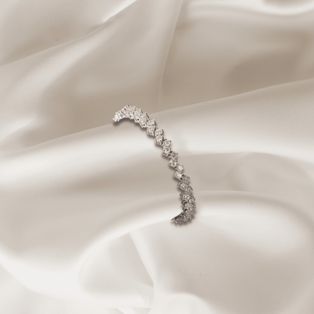 Brittany Bracelet – silver crystal rhinestone bracelet styled on abstract silk cloth background